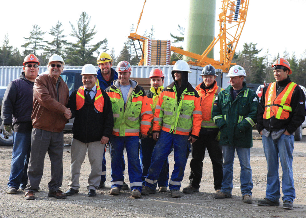 Who was involved in the planning and construction of the wind turbines?